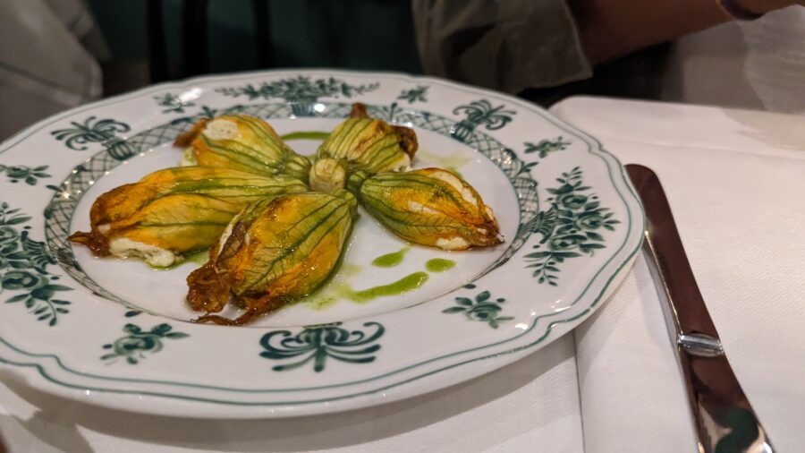 Stuffed zucchini flowers on plate