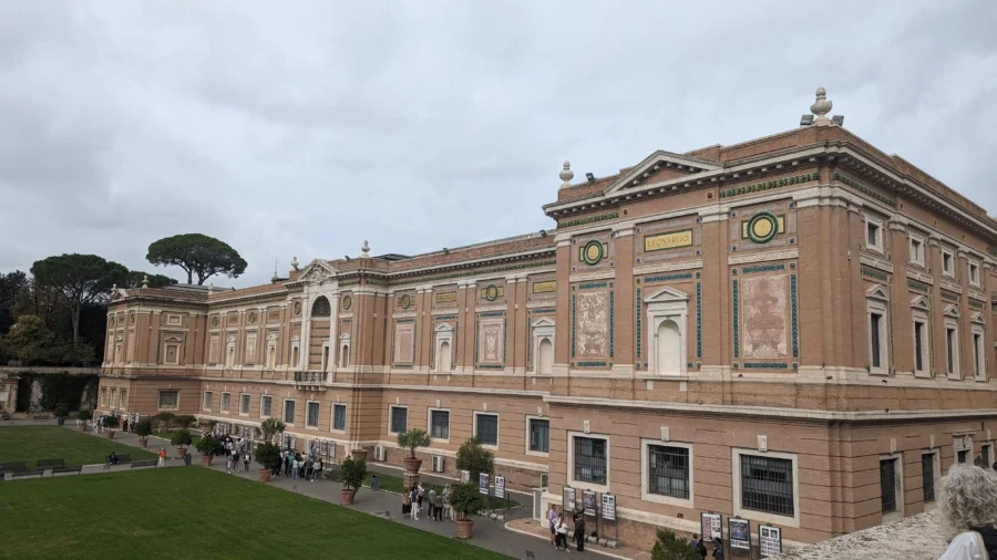 Rome Destination Guide: How to roam when in Rome 12 Historic building with green lawn.